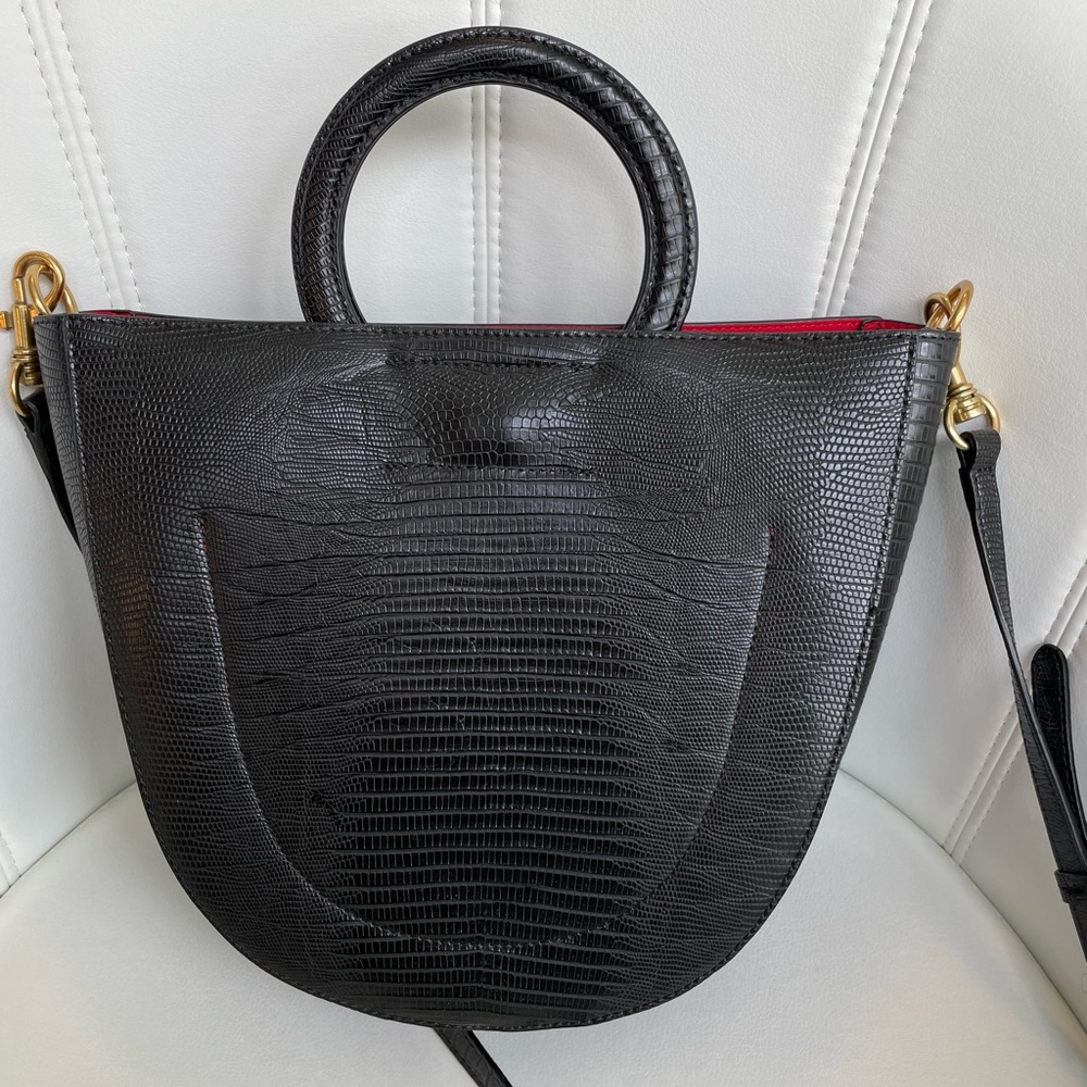 Banana Republic, cute shape purse. New, without tags, red lining!